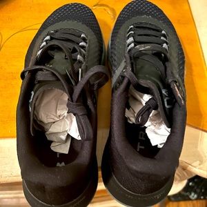 New Under Armour black tennis shoes. Men's size 10.
